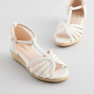 Sandales compensées blanches femme avec lanières tressées et semelle en corde – Mode été 2025
